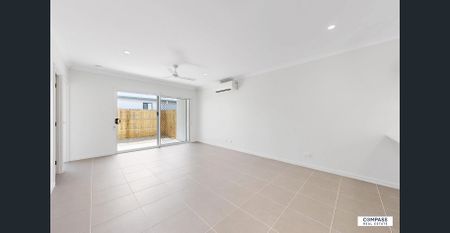 Near New 4-Bedroom Home – Modern Living in a Prime Location! - Photo 2