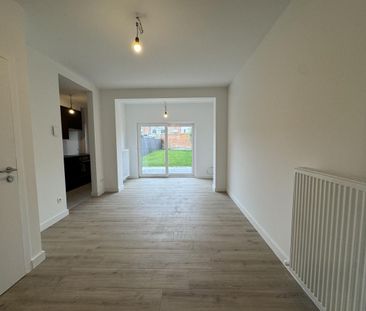Gerenoveerd gelijkvloers appartement met tuin te huur - Photo 6