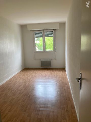 Un appartement 3 chambres proche du centre ville avec emplacement voiture. - Photo 3