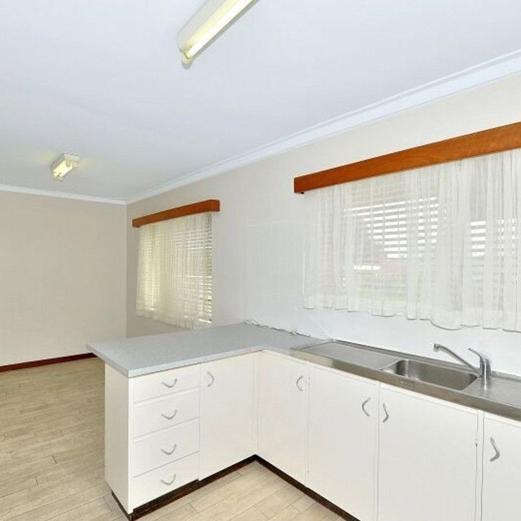 Centrally Located Family Home! - Photo 1