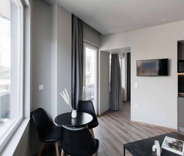 Bright 1BR Apartment at WYZ Athens - Photo 1