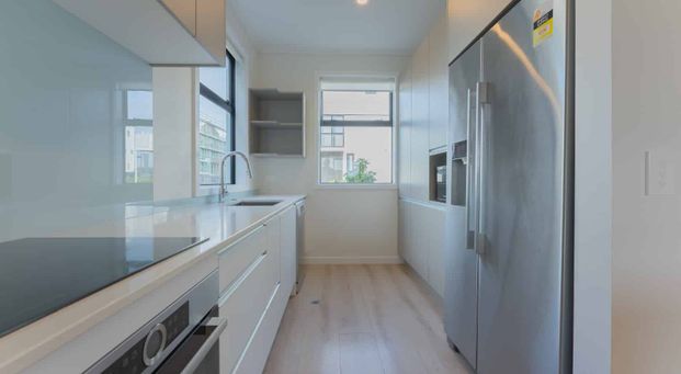 Modern 3-Bedroom Home with Sea Views in the Heart of Hobsonville Point - Photo 1