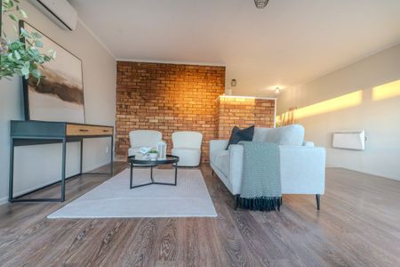 This newly renovated 2-bedroom unit offers modern, low-maintenance living in a prime location near the hospital and close to the CBD. - Photo 5