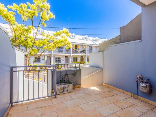 Designer townhome in a connected village setting - Photo 1