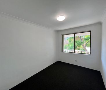Fully Upgraded Apartment with Balcony & LUG! - Photo 2