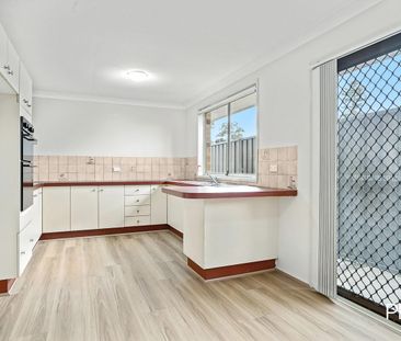 Freshly updated three bedroom home- Great location! - Photo 4