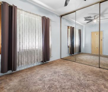 Charming 3-Bedroom Home with Spacious Yard in Elizabeth Downs - Photo 3