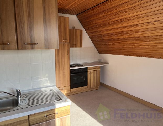 Oberwohnung in ruhiger Kanallage von Moormerland-Warsingsfehn! - Photo 1