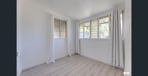 Beautifully Renovated Home Offering Comfort and Quality Living - Photo 1