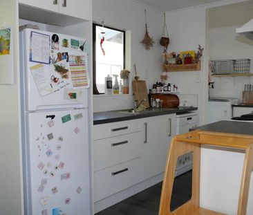 Tidy Three-Bedroom Home with Great Outdoor Living - Photo 4
