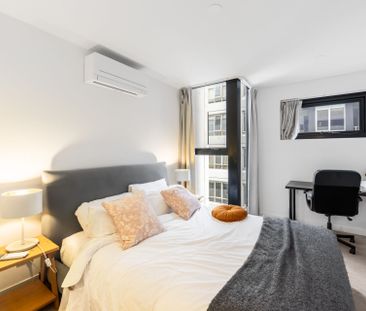 Stylish Fully Furnished Two-Bedroom Home with Modern Amenities - Photo 4