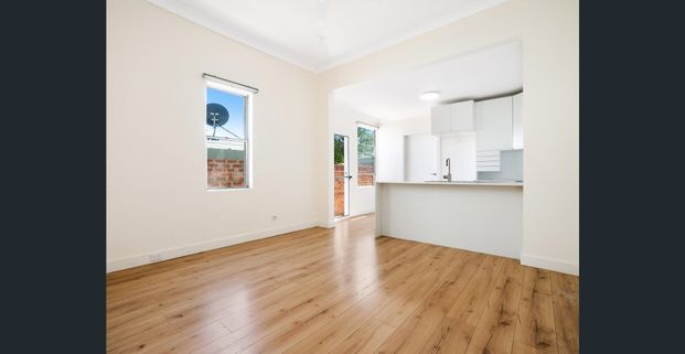 Character Home with Private Courtyard - Photo 1