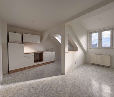 gemütliche 2 Zimmerwohnung im Dachgeschoss in Zentrumsnähe! - Foto 1