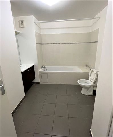 Location Appartement 3 pièces 59m² - Photo 3