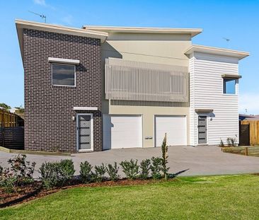 Hamptons-Style Split-Level Unit with Views! - Photo 1