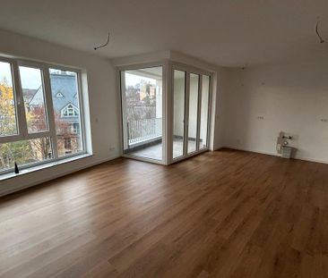 Helle 2-Zimmer-Neubauwohnung mit Loggia und Tiefgaragenstellplatz i... - Foto 1