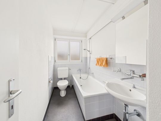 Charmante 3.5 Zimmer Wohnung mit sonnigen Wintergarten - Foto 1