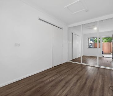 Light-Filled & Beautifully Updated Family Townhouse - Photo 3