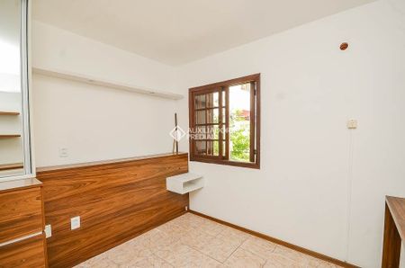 Casa em Condomínio com 2 quartos e 56m² para alugar em Vila Nova, Porto Alegre. - Photo 2