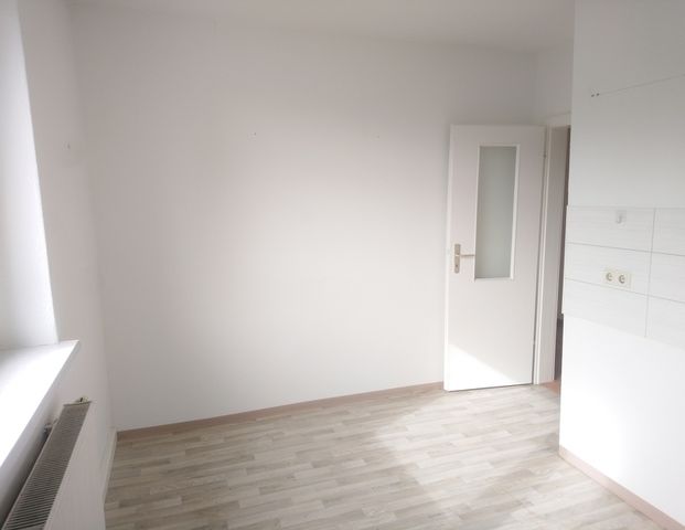 Familienfreundliche 3-Zimmer-Wohnung mit Balkon - Foto 1