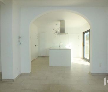 Gelijkvloerse verd. + tuin te huur - Photo 3