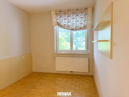 Exklusive Wohnung in Klagenfurt - mit Eigengarten und Tiefgaragenplatz - Photo 4