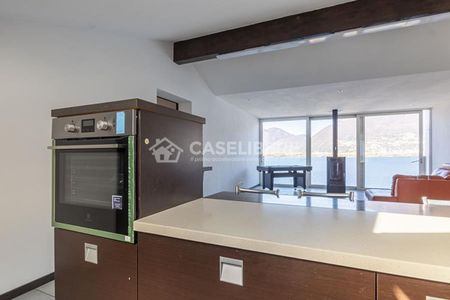 INCANTEVOLE ATTICO CON VISTA LAGO A PIAZZOGNA - Foto 2