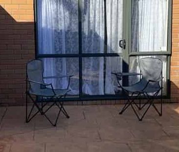 WELL PRESENTED BRICK AND TILE HOME - Photo 4