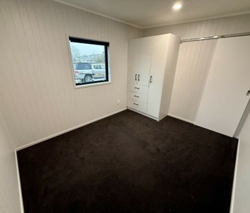 Three-Bedroom Home with Modern Comforts - Photo 1