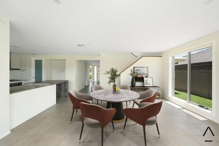 Grand Double-Storey Home in Prime Oran Park Location - Photo 2