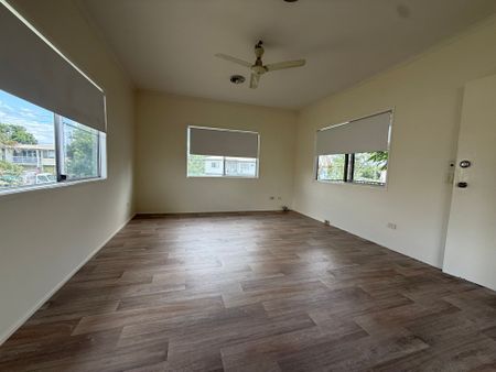 Neat and Tidy High Set with Fresh Pain and Flooring - Photo 3