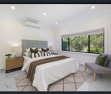 Modern 4-Bedroom Family Living with Space, Style & Convenience - Photo 3