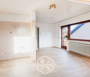 Helle 1-Zimmer-DG-Wohnung mit Balkon - Foto 1
