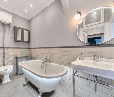 A beautifully presented two bedroom apartment in a sought after cen... - Photo 4