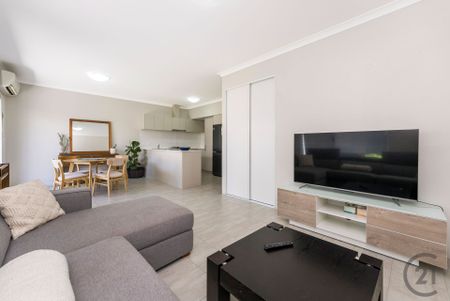 Furnished or Unfurnished Fantastic Townhouse in a Central Location! - Photo 3