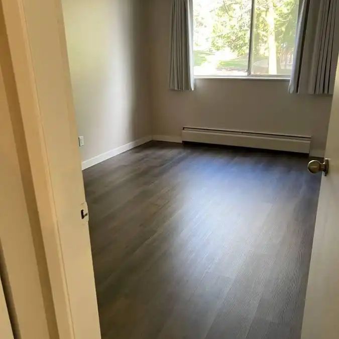 Parkside Apartments — CLOSE TO RCH & SKYTRAIN 1 Bedroom Suites Available - Photo 1