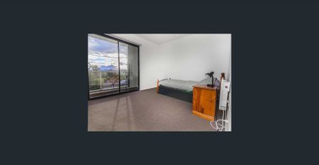 Modern Two-Bedroom Townhouse with Park Views and Prime Location - Photo 5