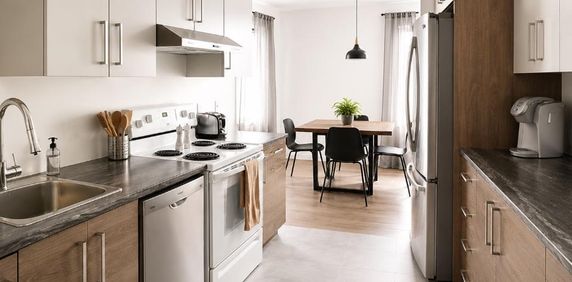 🏡 Grand 4½ lumineux avec plancher chauffant et climatiseur - Photo 2