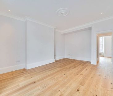 A beautifully refurbished two bedroom apartment in the heart of the... - Photo 3
