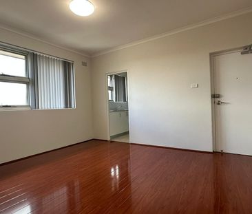 FULLY RENOVATED FLOOR 2 BEDROOM UNIT 850M TO AUBURN STATION - Photo 2