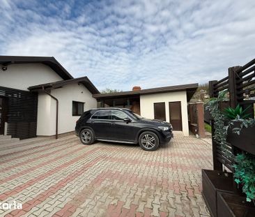 Casă cu 4 camere, 110 mp - Fotografie 2