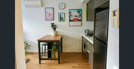 A lifestyle apartment in the heart of it all - Photo 2