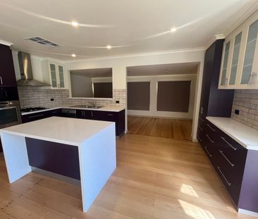 Generous 4-Bedroom Home - Photo 6