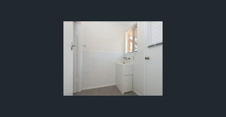 Renovated unit in sought after location - Photo 5