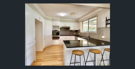 Spacious Family Home with Multiple Living Areas & Huge Parking! - Photo 5