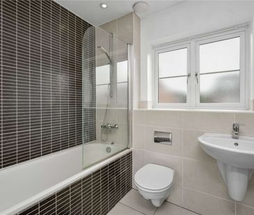 Modern four bedroom home with a private garden and garage within cl... - Photo 1