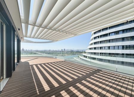 Lichtdurchflutete Dachgeschosswohnung mit beeindruckendem Panoramablick auf die Donauinsel - Photo 2