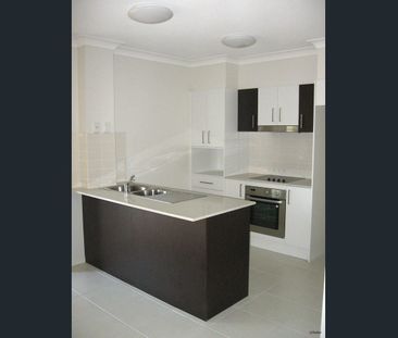 Spacious Two-Bedroom Unit Just Moments from the Beach - Photo 3