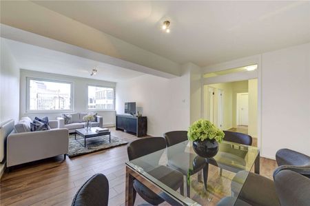 This large, bright and spacious two bedroom, two bathroom apartment is on the 5th floor and is located in the heart of Victoria. - Photo 2