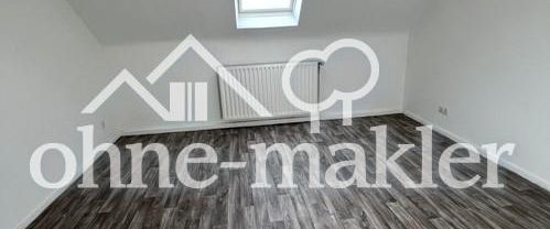 70 m² Dachgeschoss-Wohnung in zentraler Lage - Foto 1